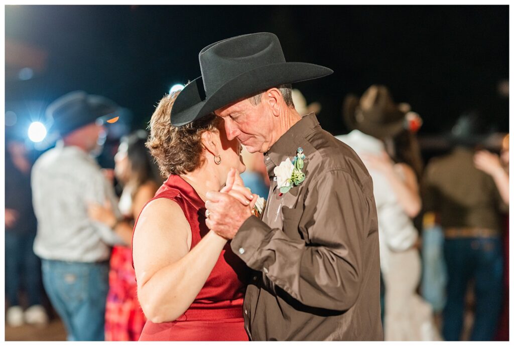 Parents of the Bride slow dancing at reception