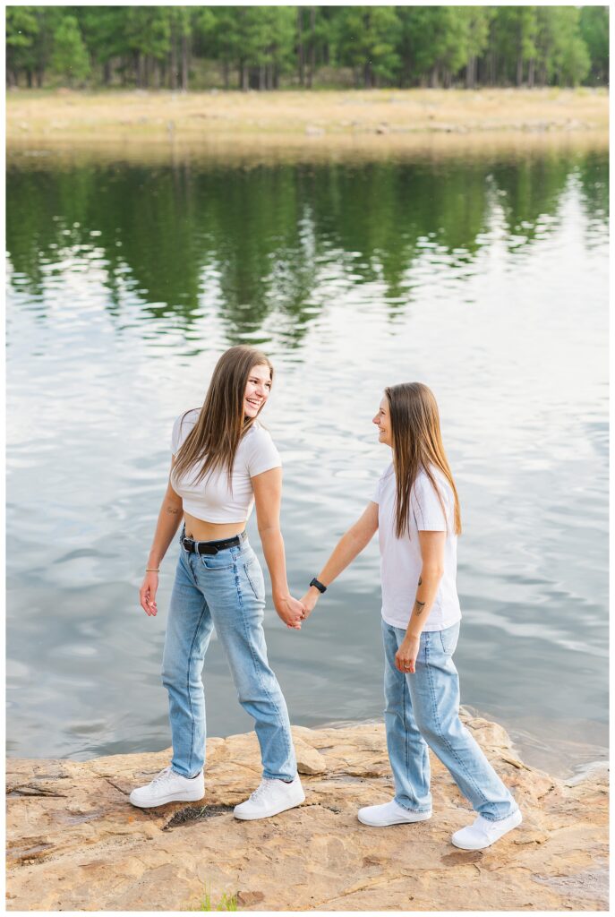 Couple walking in front of water at Willow Springs Lake