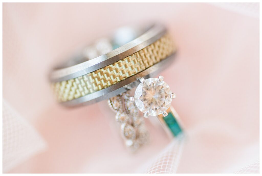 Wedding rings on pink background