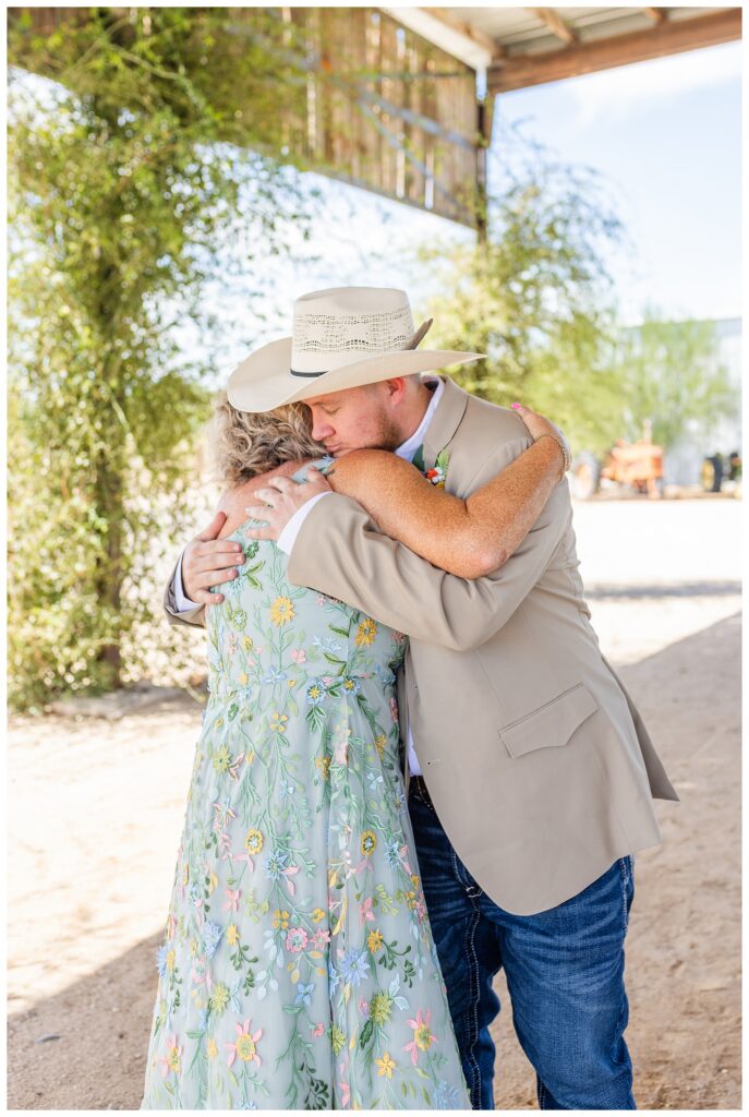 Mother and Groom hugging